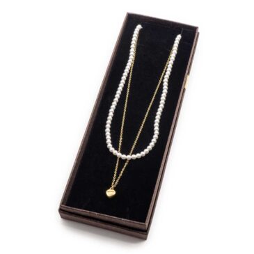 Collana girocollo a doppia catena perle e acciaio e ciondolo a cuore