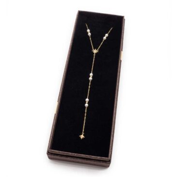 Collana girocollo in acciaio con pendente sogg. Stella e perle