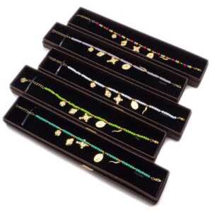 Bracciale morbido in acciaio con catena e ciondoli assortiti