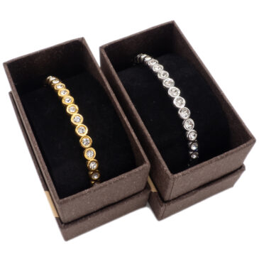 Bracciale rigido in acciaio con sfere e zirconi