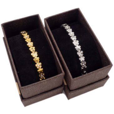 Bracciale rigido in acciaio con fiori e strass